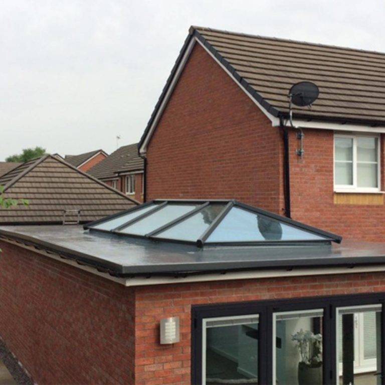 residential roofing with flat roof pitched roof and roof lantern